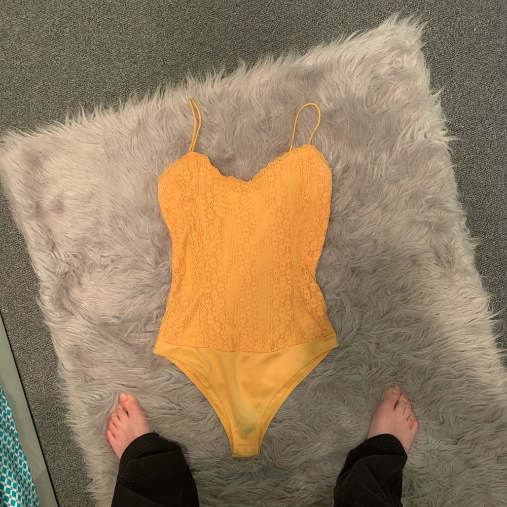 Yellow body suit